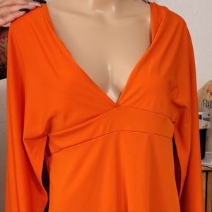 Orange mini dress with cape style back